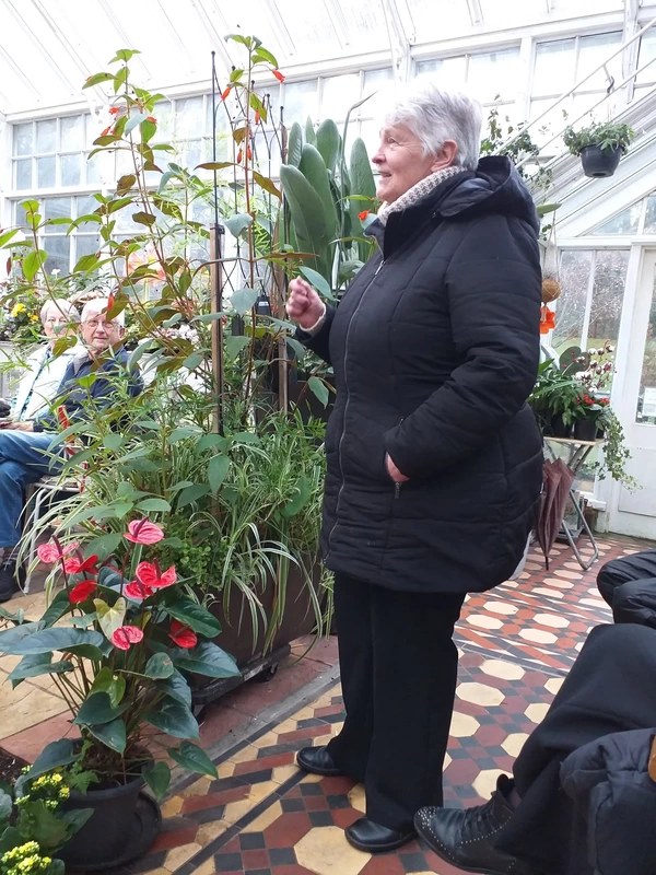 Woman reciting Burns poem in Conservatory